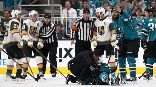 SAN JOSE, CALIFORNIA - APRIL 23: Joe Pavelski #8 of the San Jose Sharks is looked on after a hard hit by the Vegas Golden Knights in the third period in Game Seven of the Western Conference First Round during the 2019 NHL Stanley Cup Playoffs at SAP Center on April 23, 2019 in San Jose, California.