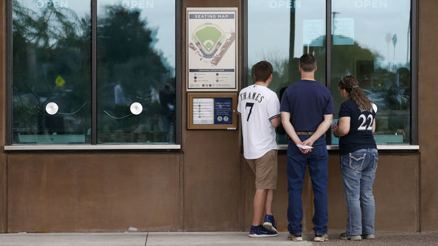 MARYVALE, - MARCH 12: Fans inquire about ticket refunds at American Family Fields stadium, spring training home of the Milwaukee Brewers, following Major League Baseball's decision to suspend all spring training games on March 12, 2020 in Phoenix, Arizona. The decision was made due to concerns of the ongoing Coronavirus (COVID-19) outbreak.