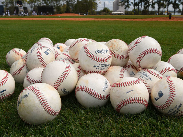 LAKELAND, FL - FEBRUARY 17: A detailed view of a group of Rawlings official Major League baseballs sitting on the field during the Detroit Tigers Spring Training workouts at the TigerTown Facility on February 17, 2020 in Lakeland, Florida.
