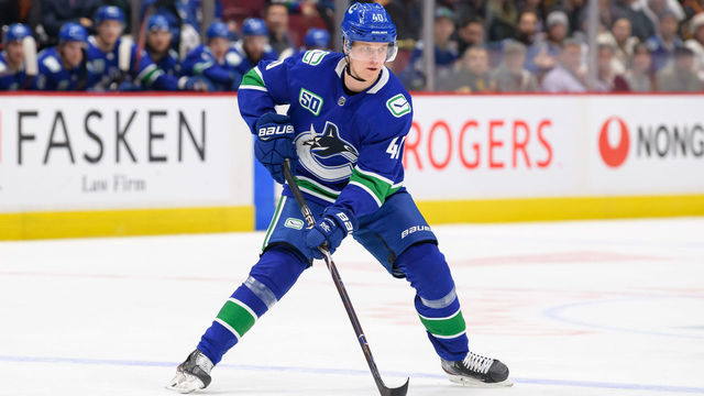 VANCOUVER, BC - DECEMBER 12: Vancouver Canucks Center Elias Pettersson (40) skates with the puck during their NHL game against the Carolina Hurricanes at Rogers Arena on December 12, 2019 in Vancouver, British Columbia, Canada.