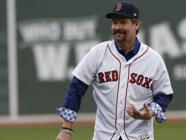 BOSTON, MA - MAY 27: Former Boston Red Sox player Wade Boggs throws out the ceremonial first pitch before the start of a game between the Boston Red Sox and Atlanta Braves at Fenway Park in Boston on May 27, 2018.