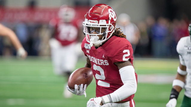 ARLINGTON, TX - DECEMBER 07: Oklahoma Sooners wide receiver CeeDee Lamb (#2) runs up field after a catch during the Big 12 championship college football game between the Oklahoma Sooners and Baylor Bears on December 7, 2019, at AT&T Stadium in Arlington, TX. .