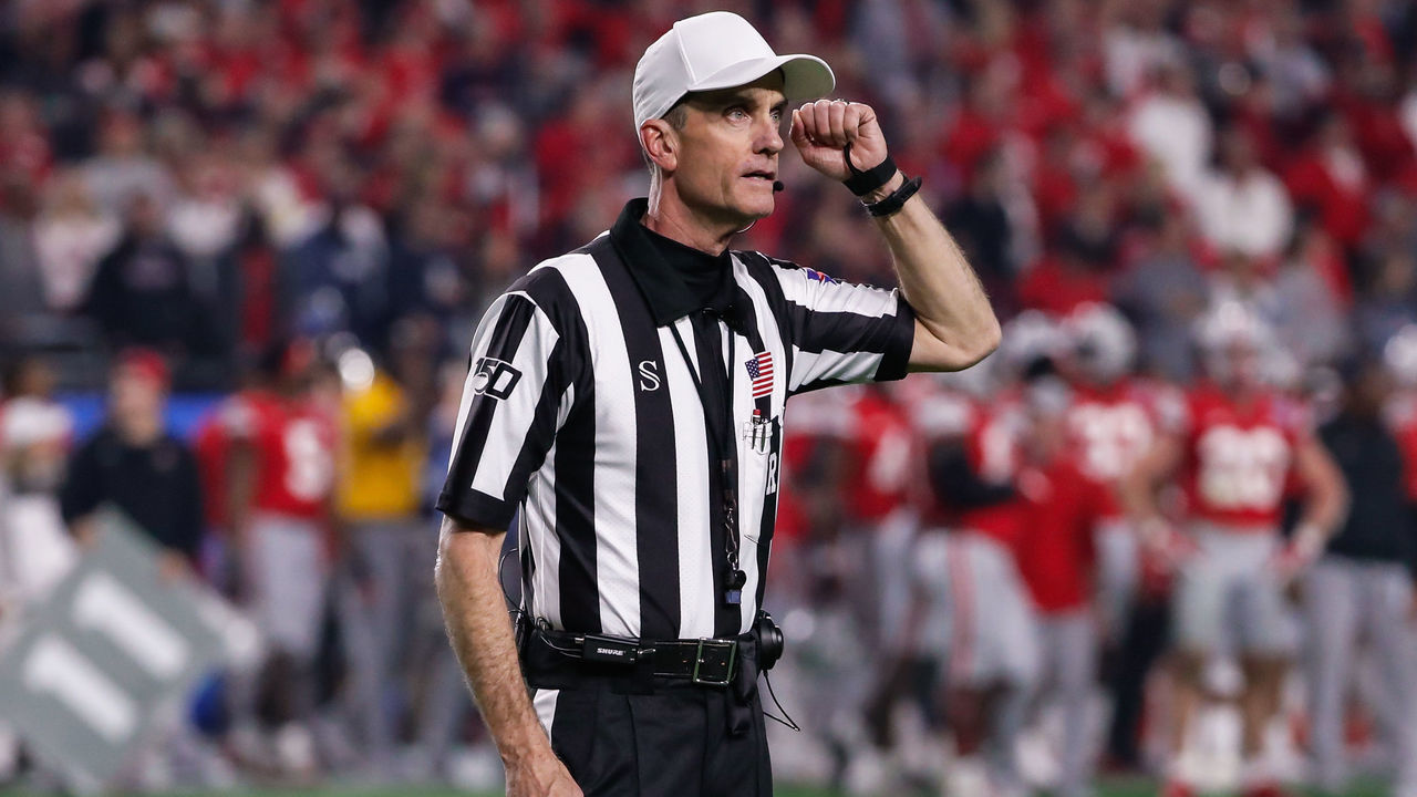 GLENDALE, AZ - DECEMBER 28: A referee signals targeting during the Fiesta Bowl college football playoff semi final game between the Clemson Tigers and the Ohio State Buckeyes on December 28, 2019 at State Farm Stadium in Glendale, Arizona.