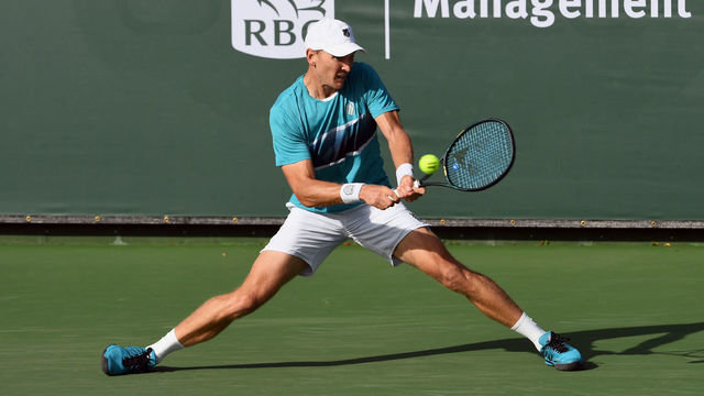 NEWPORT BEACH, CA - JANUARY 30: ATP tennis player Mitchell Krueger (USA) returns a shot during a match at the Oracle Challenger Series tennis tournament played on January 30, 2020 at the Newport Beach Tennis Club in Newport Beach, CA.