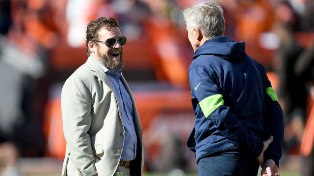 CLEVELAND, OHIO - OCTOBER 13: General manager John Schneider talks with head coach Pete Carroll of the Seattle Seahawks prior to the game against the Cleveland Browns at FirstEnergy Stadium on October 13, 2019 in Cleveland, Ohio.