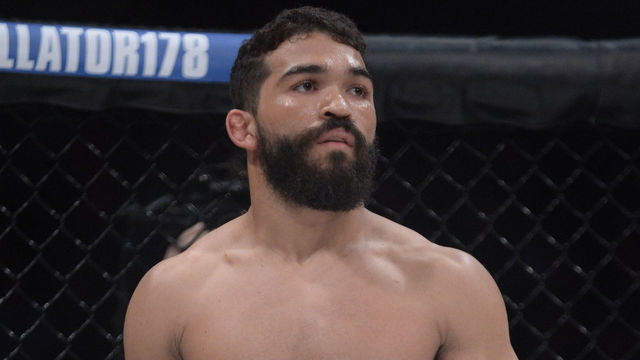 UNCASVILLE, CT - APRIL 21: Patricio Freire (blue gloves) takes on the Featherweight Champion Daniel Straus (red gloves) for the Featherweight title on April 21, 2017 at Bellator 178 at the Mohegan Sun Arena in Uncasville, Connecticut. Patricio Freire defeats Daniel Straus via guillotine choke of round 2.