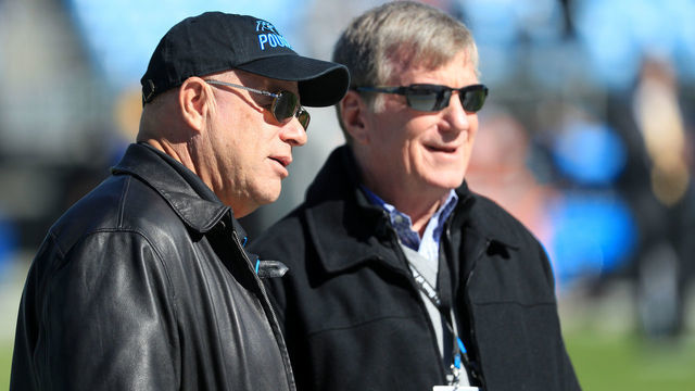 CHARLOTTE, NORTH CAROLINA - NOVEMBER 03: (L-R) Team owner, David Tepper of the Carolina Panthers talks to Panthers General Manager, Marty Hurney, before their game against the Tennessee Titans at Bank of America Stadium on November 03, 2019 in Charlotte, North Carolina.