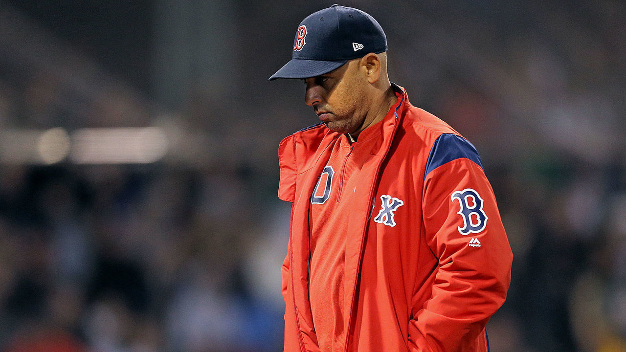 BOSTON, MA. - SEPTEMBER 18: Alex Cora #20 of the Boston Red Sox walks back to the dugout after visiting the mound during the fifth inning of the MLB game against the San Francisco Giants at Fenway Park on September 18, 2019 in Boston, Massachusetts. (Staff Photo By Matt Stone/MediaNews Group/Boston Herald)
