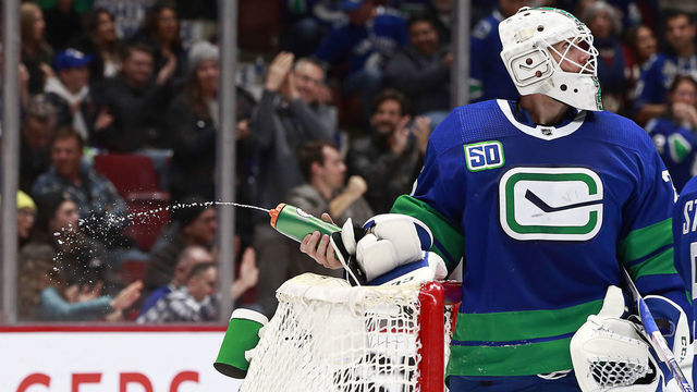 VANCOUVER, BC - FEBRUARY 22: Jacob Markstrom #25 of the Vancouver Canucks sprays water from his crease during their NHL game against the Boston Bruins at Rogers Arena February 22, 2020 in Vancouver, British Columbia, Canada. "n