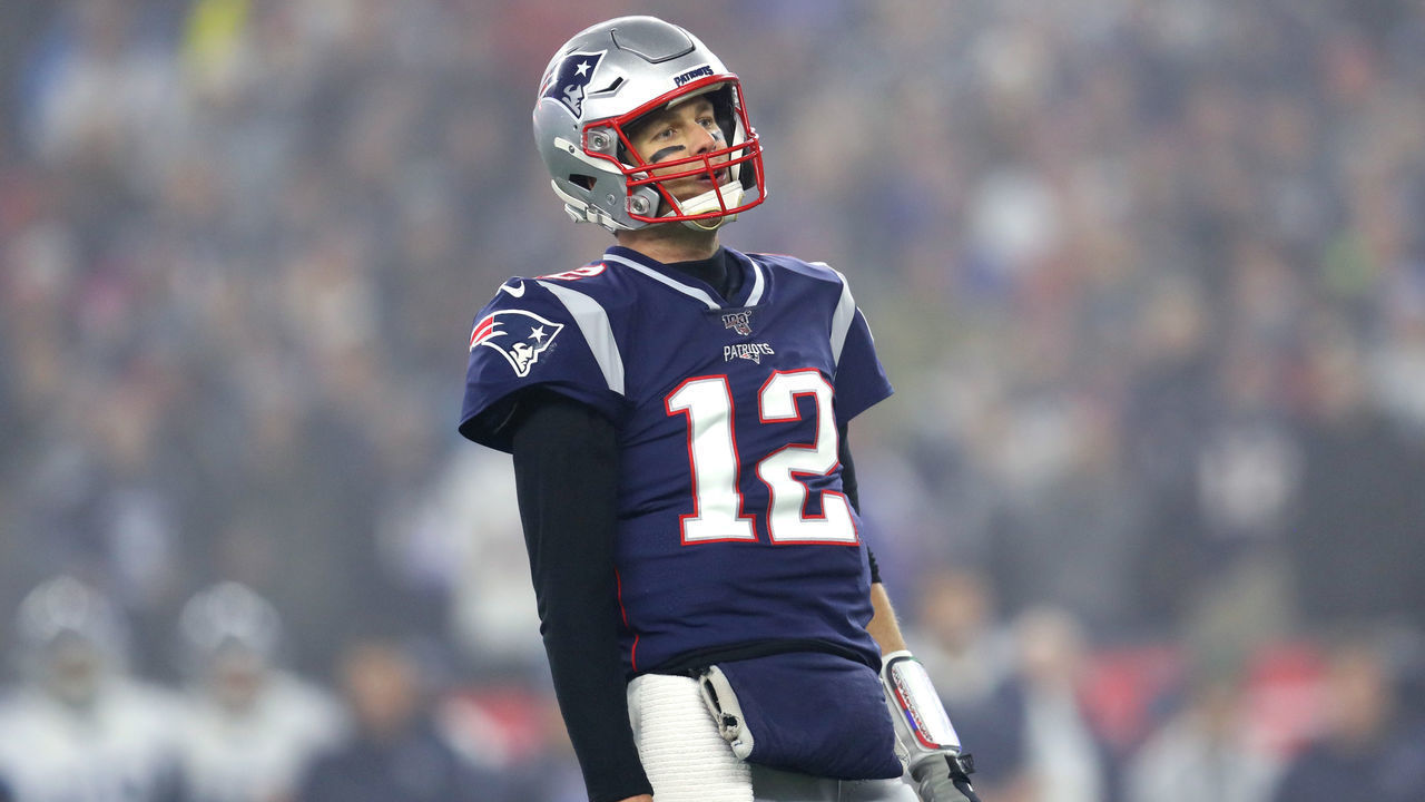 FOXBOROUGH, MASSACHUSETTS - JANUARY 04: Tom Brady #12 of the New England Patriots reacts during the the AFC Wild Card Playoff game against the Tennessee Titans at Gillette Stadium on January 04, 2020 in Foxborough, Massachusetts.