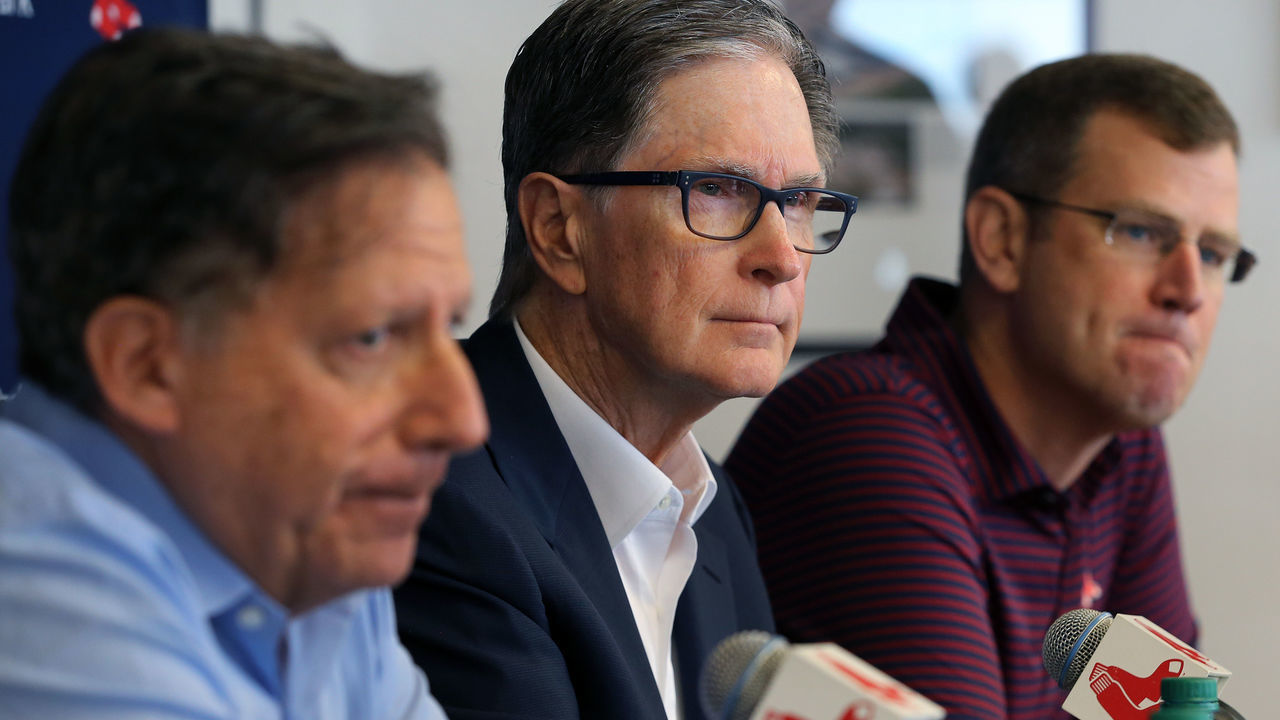 FORT MYERS, FL - FEBRUARY 17: Boston Red Sox executives, from left, Tom Werner, John Henry and Sam Kennedy meet with the media in the dining room at Jet Blue Park in Fort Myers, FL on Feb. 17, 2020 to discuss the Mookie Betts trade. The Red Sox continued Spring Training workouts at the Jet Blue Park complex.