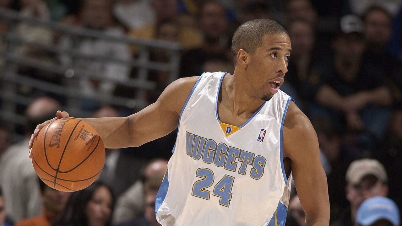DENVER - DECEMBER 2: Andre Miller #24 of the Denver Nuggets moves the ball during the game against the Cleveland Cavaliers during the game at the Pepsi Center on December 2, 2003 in Denver, Colorado. The Nuggets won 115-103.
