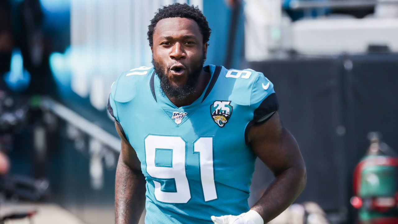 JACKSONVILLE, FLORIDA - OCTOBER 13: Yannick Ngakoue #91 of the Jacksonville Jaguars charges onto the field to face the New Orleans Saints before the start of the first quarter at TIAA Bank Field on October 13, 2019 in Jacksonville, Florida.