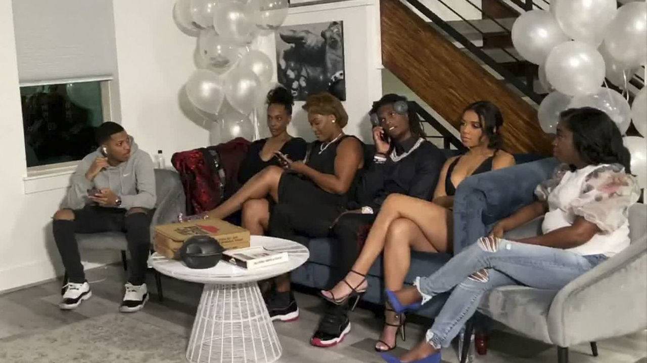 UNSPECIFIED LOCATION - APRIL 23: (EDITORIAL USE ONLY) In this still image from video provided by the NFL, CeeDee Lamb, third from right, talks on a phone after being selected by the Dallas Cowboys during the first round of the 2020 NFL Draft on April 23, 2020.
