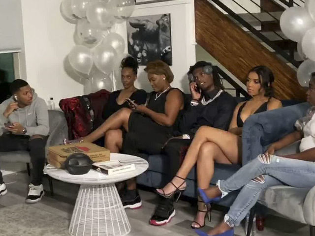 UNSPECIFIED LOCATION - APRIL 23: (EDITORIAL USE ONLY) In this still image from video provided by the NFL, CeeDee Lamb, third from right, talks on a phone after being selected by the Dallas Cowboys during the first round of the 2020 NFL Draft on April 23, 2020.
