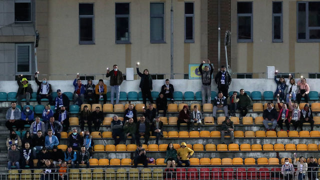 BREST, BELARUS - APRIL 12, 2020: Dinamo Brest football fans during a 2020 Belarusian Premier League Round 4 football match between Dinamo Brest and Isloch Minsk District at Brestsky Stadium. The Football Federation of Belarus has decided not to postpone the national football championship in connection with the pandemic of the novel coronavirus, with the 30th season of the Belarusian Premier League starting as scheduled on 19 March 2020. Natalia Fedosenko/TASS