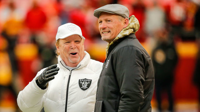 KANSAS CITY, MO - DECEMBER 01: Oakland Raiders owner Mark Davis, left, watches his team during warmups with Oakland Raiders general manager Mike Mayock prior to the game against the Kansas City Chiefs at Arrowhead Stadium on December 1, 2019 in Kansas City, Missouri.