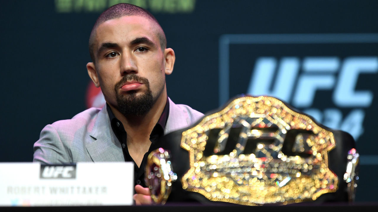 MELBOURNE, AUSTRALIA - FEBRUARY 8: UFC middleweight champion Robert Whittaker of Australia speaks to the media during the UFC 234 Press Conference inside The Palms at Crown on February 8, 2019 in Melbourne, Australia.