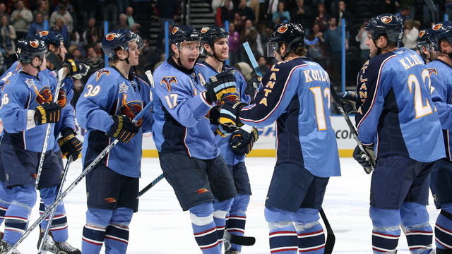 ATLANTA - DECEMBER 5: Ilya Kovalchuk #17 of the Atlanta Thrashers celebrates with Slava Kozlov #13 after scoring the game winning goal in the shootout against the New York Islanders at Philips Arena on December 5, 2007 in Atlanta, Georgia.