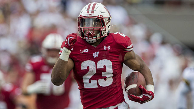 MADISON, WI - SEPTEMBER 21: Wisconsin Badgers running back Jonathan Taylor (23) breaks a lone run for his second touchdown of the first quarter durning a college football game between the Michigan Wolverines and the Wisconsin Badgers on September 21, 2019, at Camp Randall Stadium in Madison, WI.