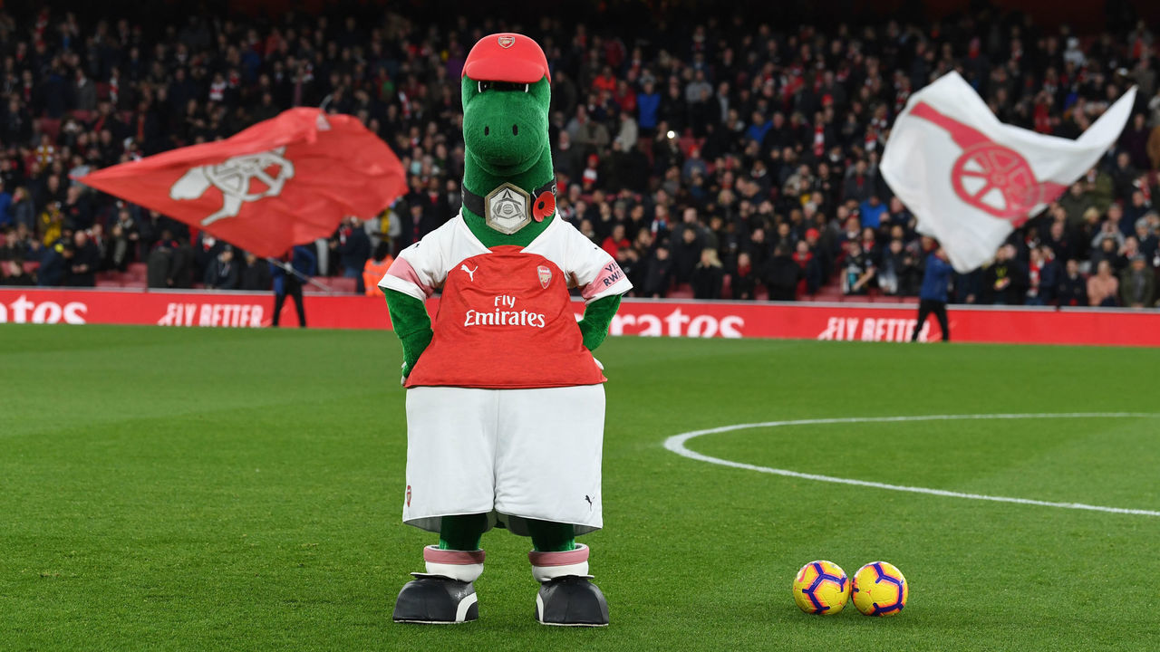 LONDON, ENGLAND - NOVEMBER 11: Arsenal mascot Gunnersaurus before the Premier League match between Arsenal FC and Wolverhampton Wanderers at Emirates Stadium on November 11, 2018 in London, United Kingdom.