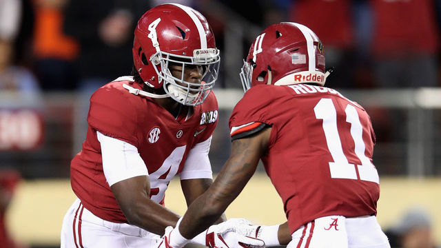 SANTA CLARA, CA - JANUARY 07: Jerry Jeudy #4 of the Alabama Crimson Tide is congratulated by his teammate Henry Ruggs III #11 after scoring a first quarter touchdown reception against the Clemson Tigersin the CFP National Championship presented by AT&T at Levi's Stadium on January 7, 2019 in Santa Clara, California.