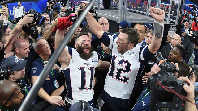 ATLANTA, GA - FEBRUARY 03: Julian Edelman #11 of the New England Patriots and teammate Tom Brady #12 celebrate at the end of the Super Bowl LIII at Mercedes-Benz Stadium on February 3, 2019 in Atlanta, Georgia. The New England Patriots defeat the Los Angeles Rams 13-3.