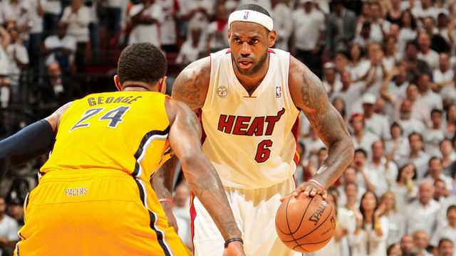 MIAMI, FL - JUNE 3: LeBron James #6 of the Miami Heat controls the ball against Paul George #24 of the Indiana Pacers in Game Seven of the Eastern Conference Finals during the 2013 NBA Playoffs on June 3, 2013 at American Airlines Arena in Miami, Florida. NOTE TO USER: User expressly acknowledges and agrees that, by downloading and/or using this photograph, user is consenting to the terms and conditions of the Getty Images License Agreement. Mandatory copyright notice: Copyright NBAE 2013