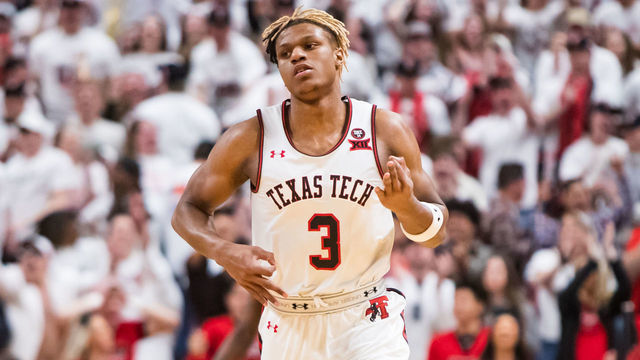 LUBBOCK, TEXAS - MARCH 07: Guard Jahmi'us Ramsey #3 of the Texas Tech Red Raiders signals after making a three-pointer during the first half of the college basketball game against the Kansas Jayhawks on March 07, 2020 at United Supermarkets Arena in Lubbock, Texas.