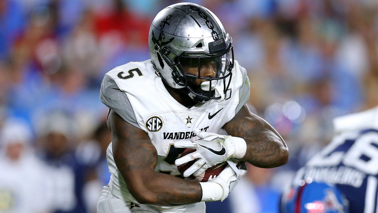 OXFORD, MISSISSIPPI - OCTOBER 05: Ke'Shawn Vaughn #5 of the Vanderbilt Commodores runs with the ball during a game against the Mississippi Rebels at Vaught-Hemingway Stadium on October 05, 2019 in Oxford, Mississippi.