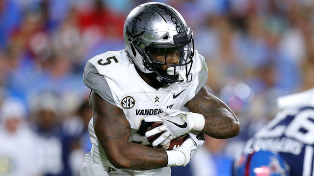 OXFORD, MISSISSIPPI - OCTOBER 05: Ke'Shawn Vaughn #5 of the Vanderbilt Commodores runs with the ball during a game against the Mississippi Rebels at Vaught-Hemingway Stadium on October 05, 2019 in Oxford, Mississippi.