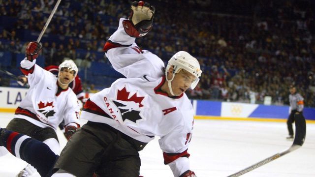 24 Feb 2002: Joe Sakic #91 of Canada celebrates after scoring the team's fifth goal against the USA during the men's ice hockey gold medal game of the Salt Lake City Winter Olympic Games at the E Center in Salt Lake City, Utah. DIGITAL IMAGE. Mandatory Credit: Al Bello/Getty Images