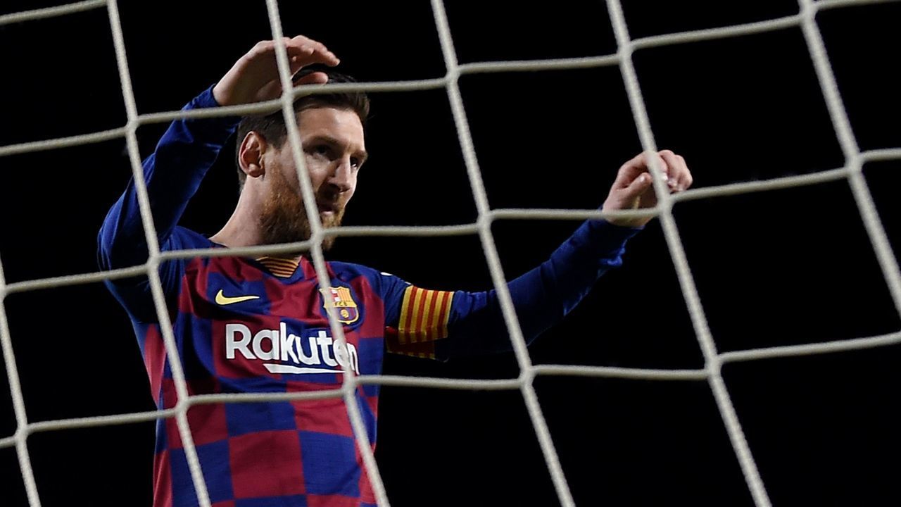 Barcelona's Argentine forward Lionel Messi reacts after missing a goal opportunity during the Spanish league football match between FC Barcelona and Real Sociedad at the Camp Nou stadium in Barcelona on March 7, 2020.