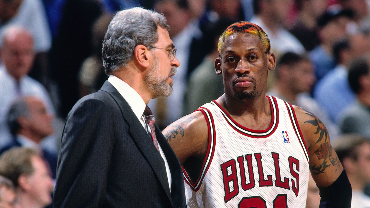 CHICAGO, IL - MAY 13: Head Coach Phil Jackson and Dennis Rodman #91 of the Chicago Bulls talk during a game against the Charlotte Hornets during Game Five of the Eastern Conference Semifinals of the 1998 Playoffs on May 13, 1998 at the United Center in Chicago, Illinois. NOTE TO USER: User expressly acknowledges and agrees that, by downloading and/or using this photograph, user is consenting to the terms and conditions of the Getty Images License Agreement. Mandatory Copyright Notice: Copyright 1998 NBAE