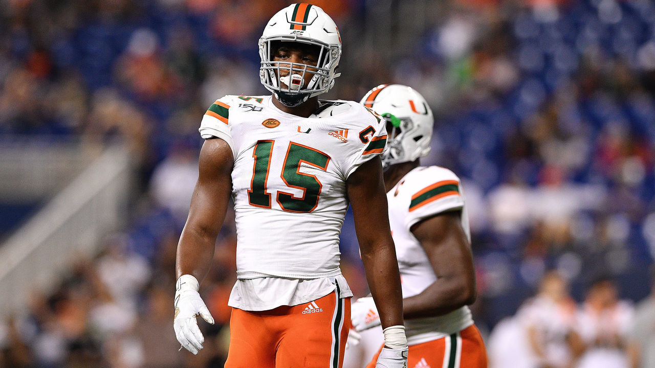 MIAMI, FLORIDA - NOVEMBER 23: Gregory Rousseau #15 of the Miami Hurricanes in action against the FIU Golden Panthers in the first half at Marlins Park on November 23, 2019 in Miami, Florida.