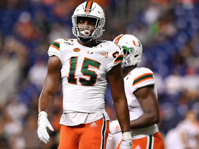 MIAMI, FLORIDA - NOVEMBER 23: Gregory Rousseau #15 of the Miami Hurricanes in action against the FIU Golden Panthers in the first half at Marlins Park on November 23, 2019 in Miami, Florida.