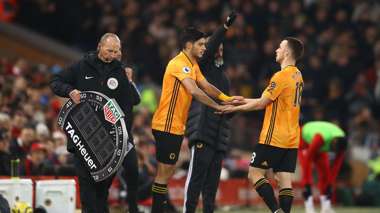 LIVERPOOL, ENGLAND - DECEMBER 29: Raul Jimenez of Wolverhampton Wanderers replaces team-mate Diogo Jota during the Premier League match between Liverpool FC and Wolverhampton Wanderers at Anfield on December 29, 2019 in Liverpool, United Kingdom.