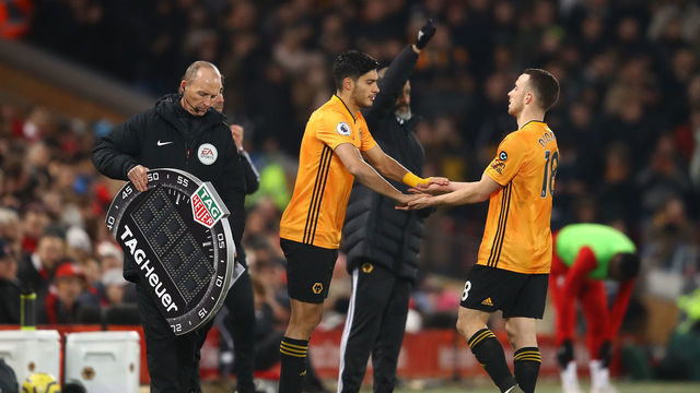 LIVERPOOL, ENGLAND - DECEMBER 29: Raul Jimenez of Wolverhampton Wanderers replaces team-mate Diogo Jota during the Premier League match between Liverpool FC and Wolverhampton Wanderers at Anfield on December 29, 2019 in Liverpool, United Kingdom.