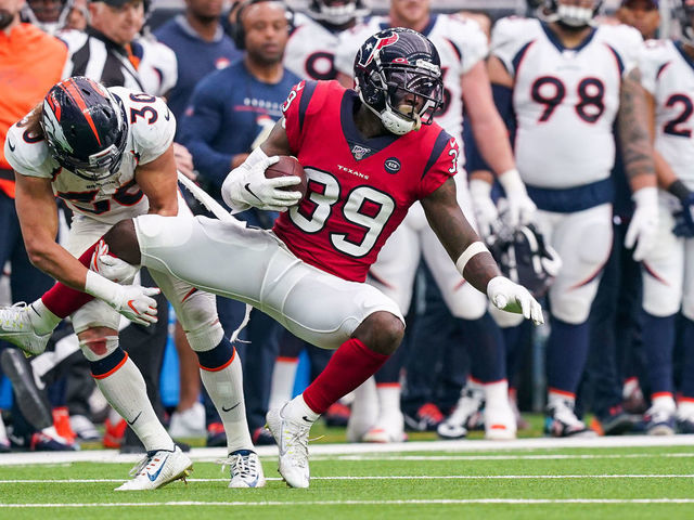 HOUSTON, TX - DECEMBER 08: Denver Broncos running back Phillip Lindsay (30) tackles Houston Texans free safety Tashaun Gipson (39) after Gipson's interception return during the NFL game between the Denver Broncos and Houston Texans on December 8, 2019 at NRG Stadium in Houston, TX.