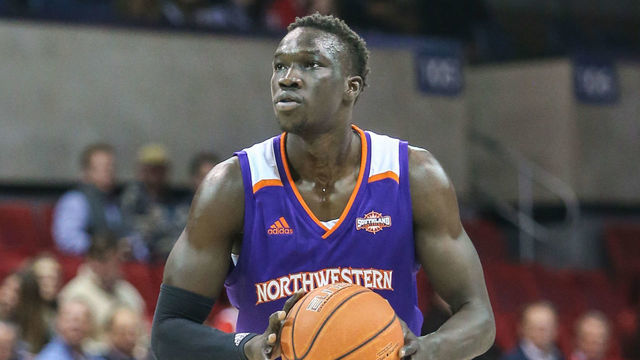 DALLAS, TX - DECEMBER 03: Northwestern State Demons forward Chudier Bile (4) looks to pass the ball during the game between SMU and Northwestern State on December 3, 2019 at Moody Coliseum in Dallas, TX.