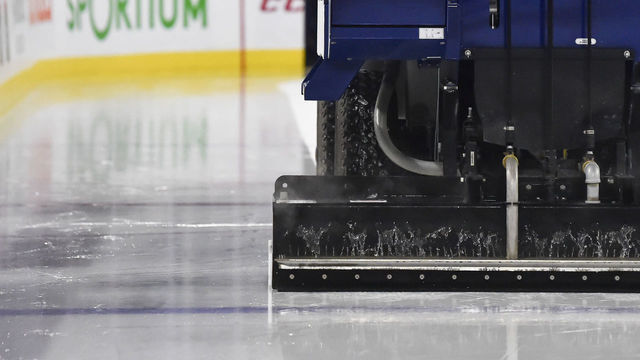 LAVAL, QC - MARCH 09: An ice resurfacing machine floods the rink prior to the match between the Laval Rocket and the Utica Comets during the AHL game at Place Bell on March 9, 2019 in Laval, Quebec, Canada. The Laval Rocket defeated the The Utica Comets 5-3.