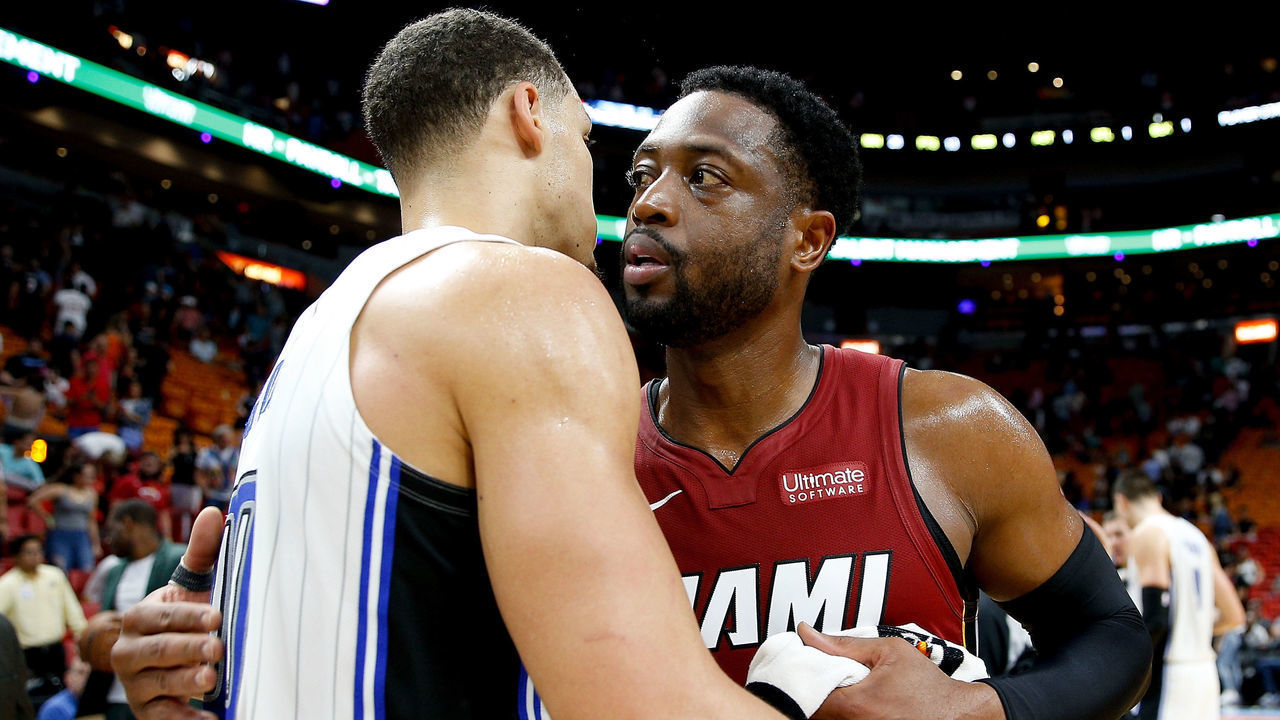 MIAMI, FL - DECEMBER 04: Aaron Gordon #00 of the Orlando Magic greets Dwyane Wade #3 of the Miami Heat after the game at American Airlines Arena on December 4, 2018 in Miami, Florida.