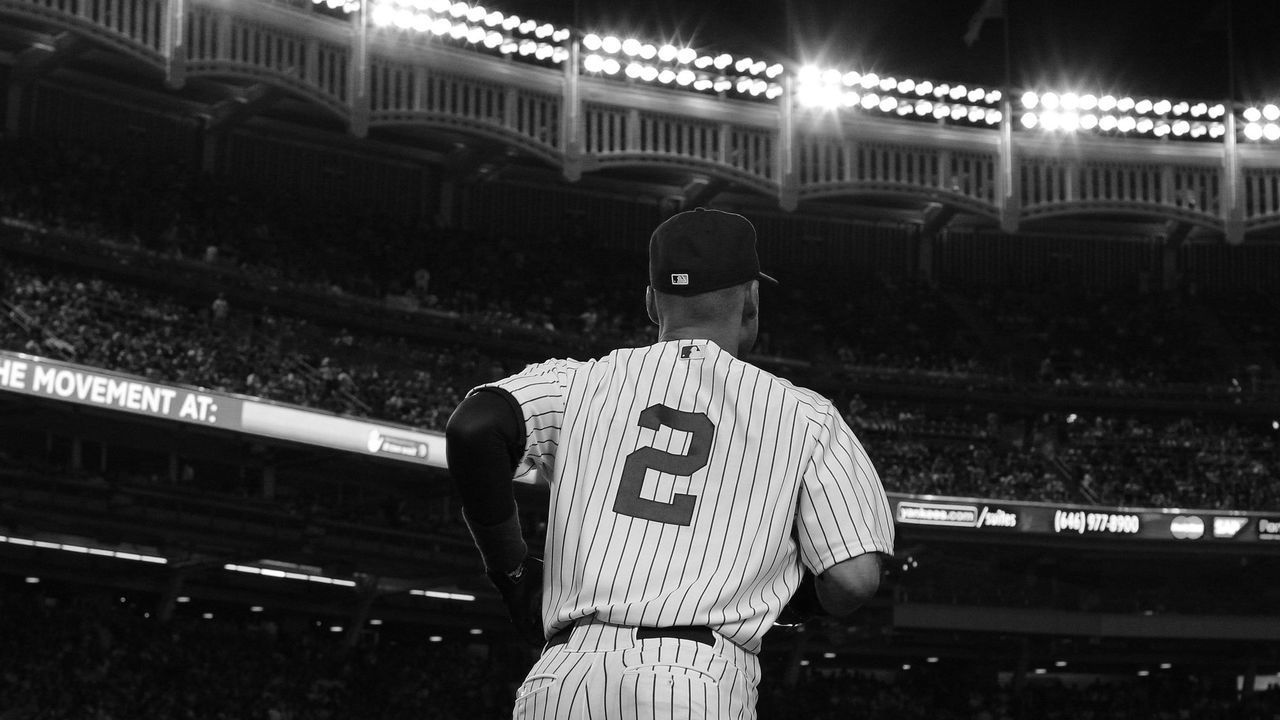 Derek Jeter, New York Yankees, heads onto the field during the New York Yankees Vs Cincinnati Reds baseball game at Yankee Stadium, The Bronx, New York. 18th July 2014. Photo Tim Clayton