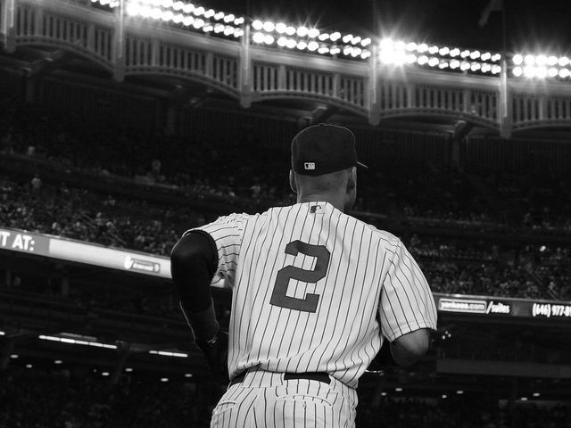 Derek Jeter, New York Yankees, heads onto the field during the New York Yankees Vs Cincinnati Reds baseball game at Yankee Stadium, The Bronx, New York. 18th July 2014. Photo Tim Clayton