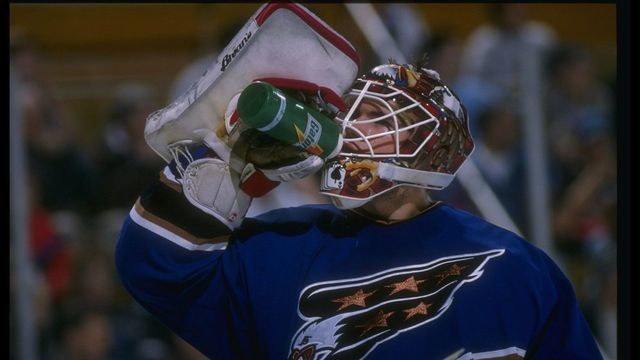 3 Apr 1996: Goaltender Jim Carey of the Washington Capitals takes a drink during a game against the Buffalo Sabres at Memorial Auditorium in Buffalo, New York. Mandatory Credit: Rick Stewart /Allsport