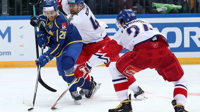 MOSCOW, RUSSIA DECEMBER 16, 2018: Sweden's Mathias Brome (L) and the Czech Republic's Jakub Kindl in action in their 2018-19 Euro Hockey Tour Channel One Cup ice hockey match at CSKA Arena. Mikhail Tereshchenko/TASS
