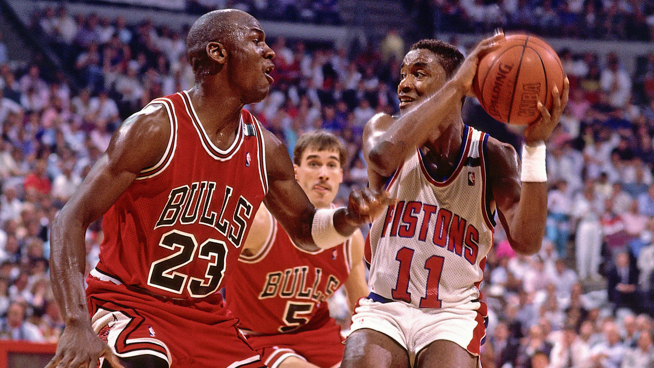 AUBURN HILLS, MI - 1988: Isiah Thomas #11 of the Detroit Pistons stops his drives against Michael Jordan #23 of the Chicago Bulls during an NBA game in 1988 at The Palace in Auburn Hills, Michigan. NOTE TO USER: User expressly acknowledges and agrees that, by downloading and/or using this Photograph, user is consenting to the terms and conditions of the Getty Images License Agreement. Mandatory Copyright Notice: Copyright 1988 NBAE