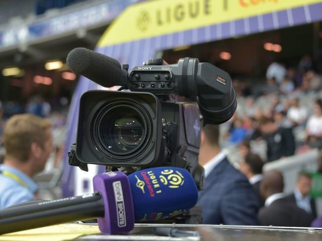 A microphone of Bein Sports TV channel and a camera are pictured during the French L1 football match between Toulouse and Nimes on August 25, 2018 at the Municipal Stadium in Toulouse, southern France.