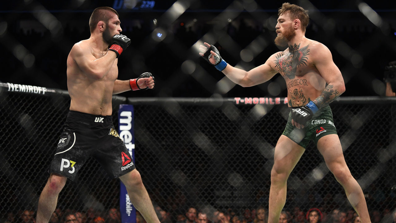LAS VEGAS, NV - OCTOBER 06: (L-R) Khabib Nurmagomedov of Russia faces Conor McGregor of Ireland in their UFC lightweight championship bout during the UFC 229 event inside T-Mobile Arena on October 6, 2018 in Las Vegas, Nevada.