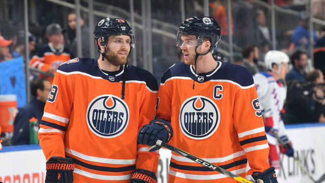 EDMONTON, AB - MARCH 11: Connor McDavid #97 and Leon Draisaitl #29 of the Edmonton Oilers warm up prior to the game against the New York Rangers on March 11, 2019 at Rogers Place in Edmonton, Alberta, Canada.